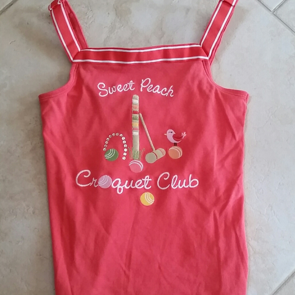 A cute girls pink tank top